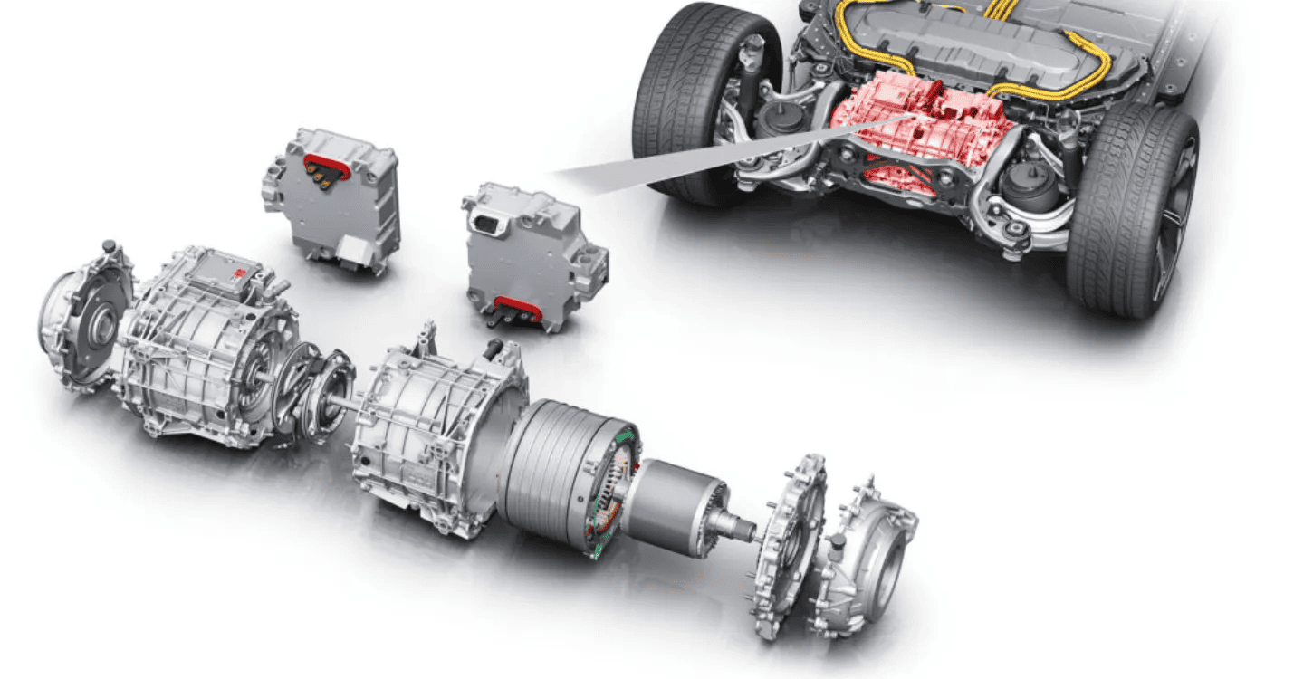 Exploded view of drivetrain components with a vehicle diagram showing the power unit location