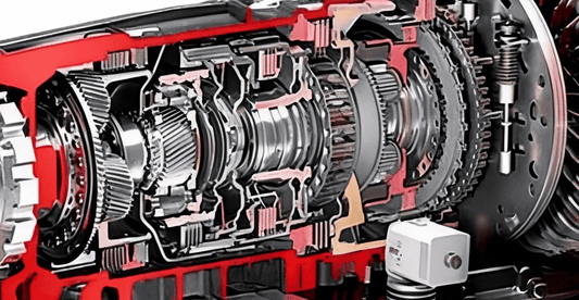 Automatic transmission cutaway showing internal clutch packs, gears, and hydraulic components
